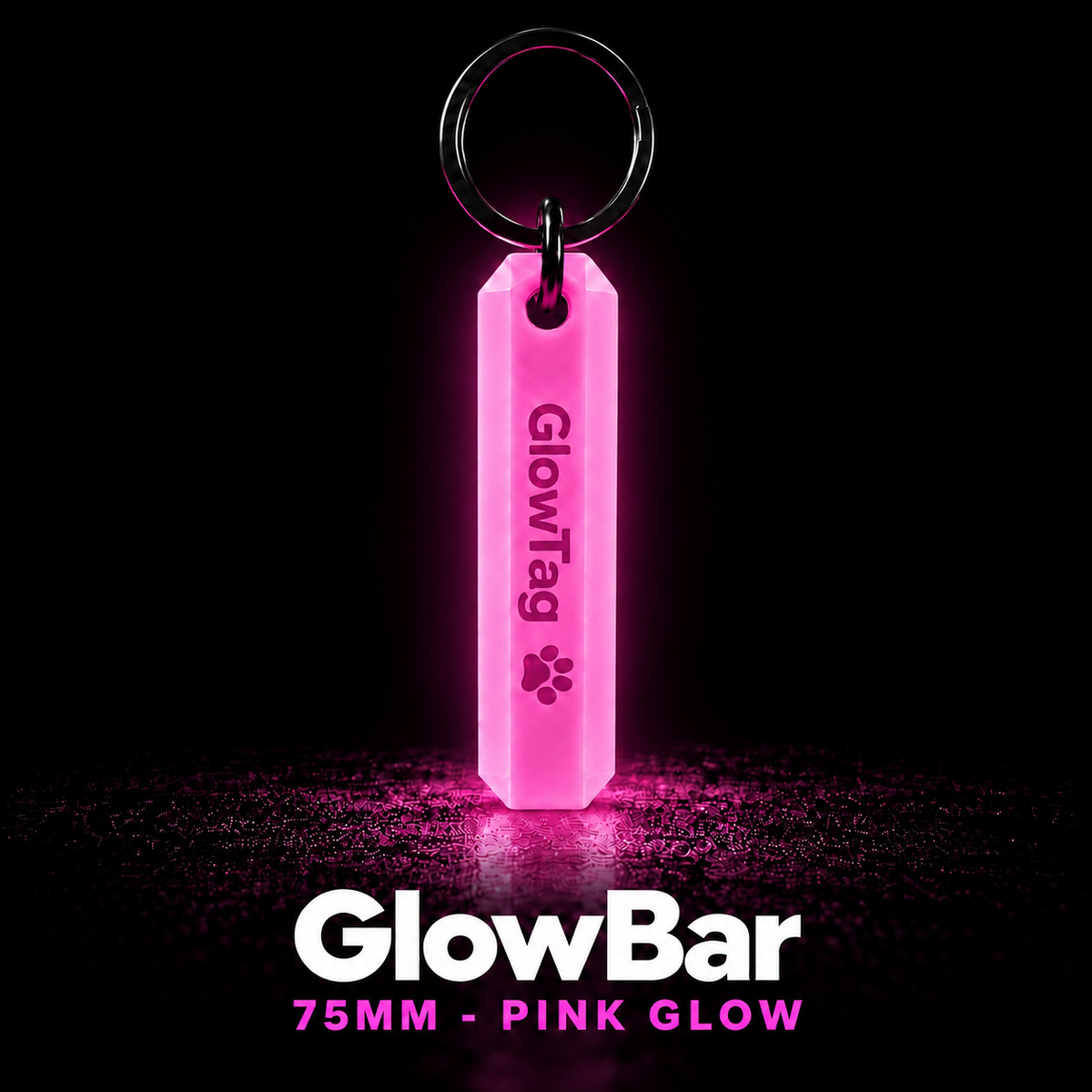 GlowBar 75mm glow in the dark keyring glowing pink in the dark, with black split ring
