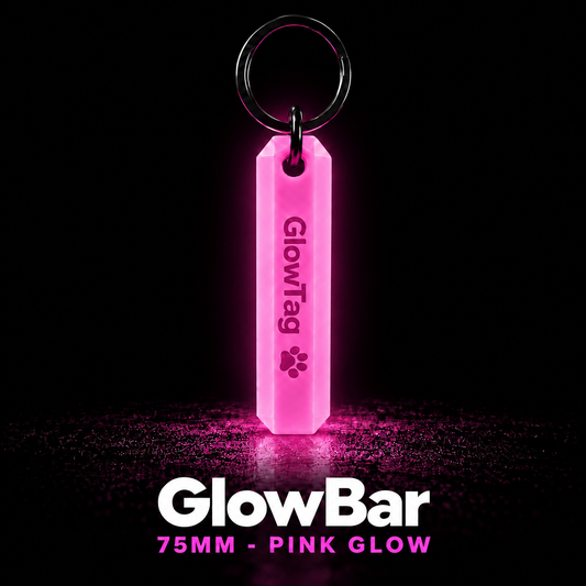 GlowBar 75mm glow in the dark keyring glowing pink in the dark, with black split ring